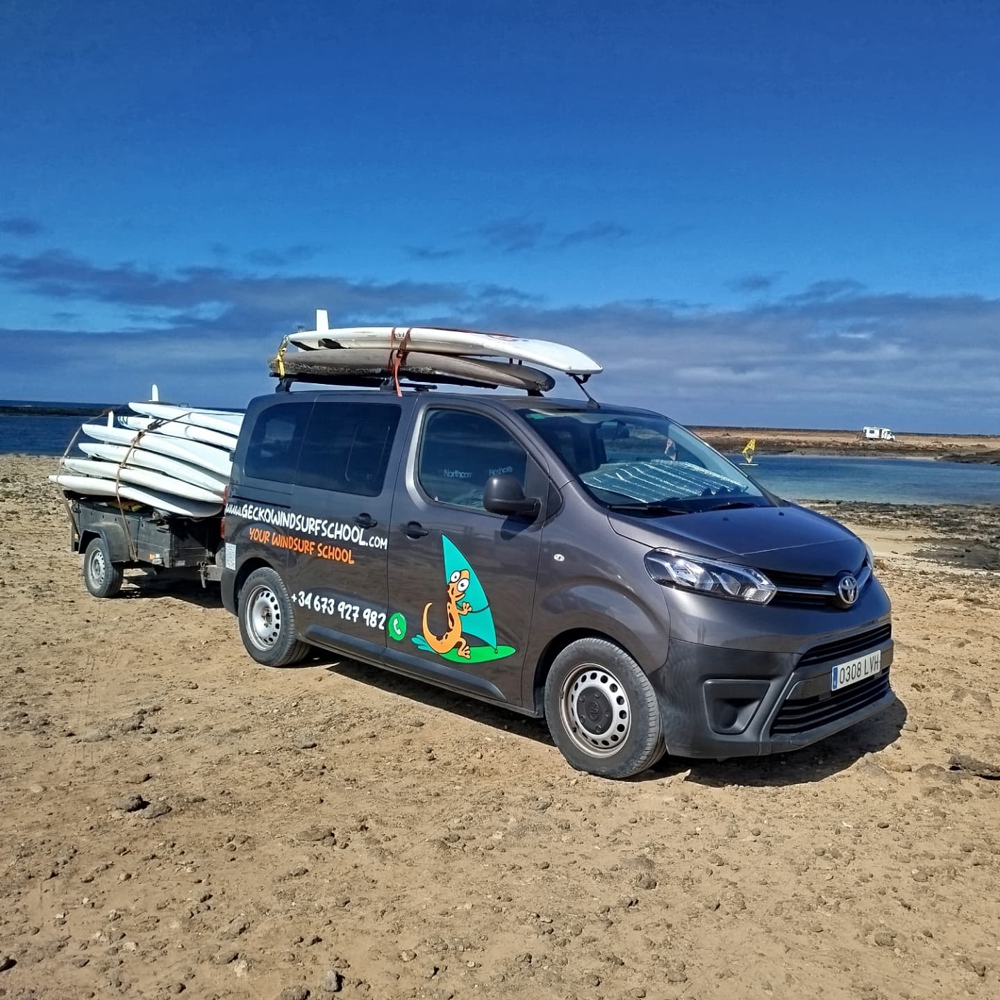 The Gecko Windsurf van and trailer, fully loaded with boards, ready to go wherever the wind is